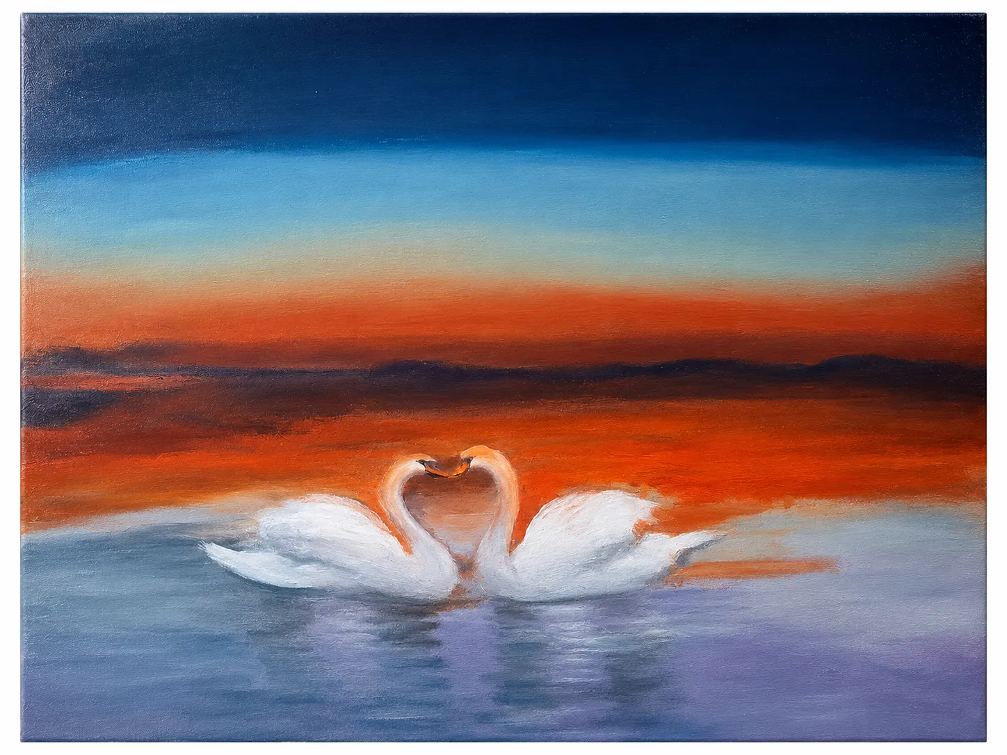 Serene sunset with swans in reflection